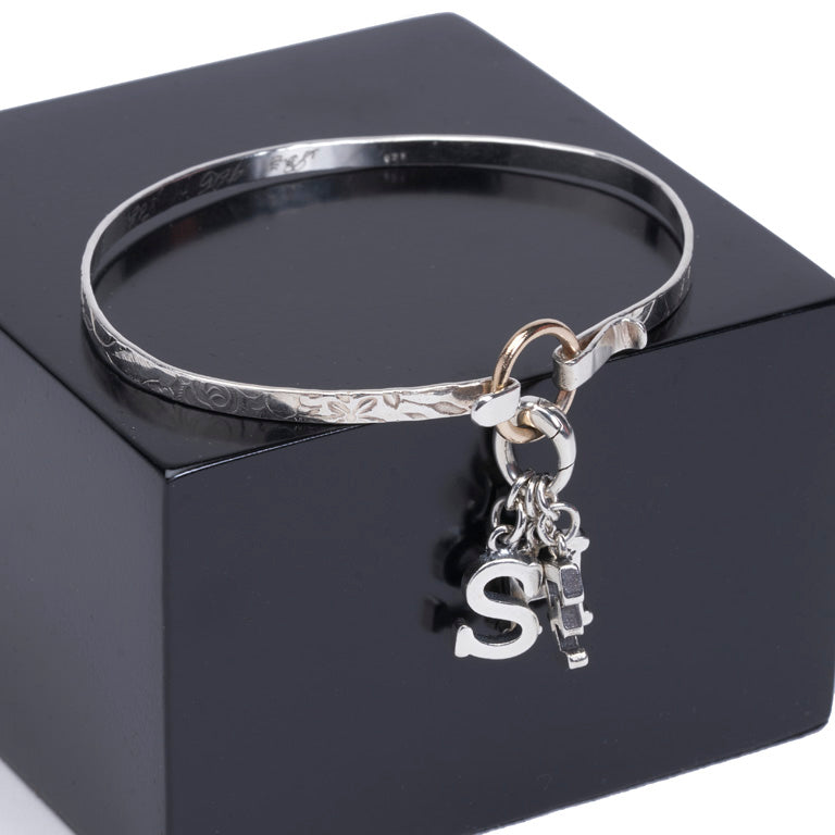 The Classic Eclipse Bracelet - Sterling Silver Hammered Band with Twisted Silver Eclipse Hoop