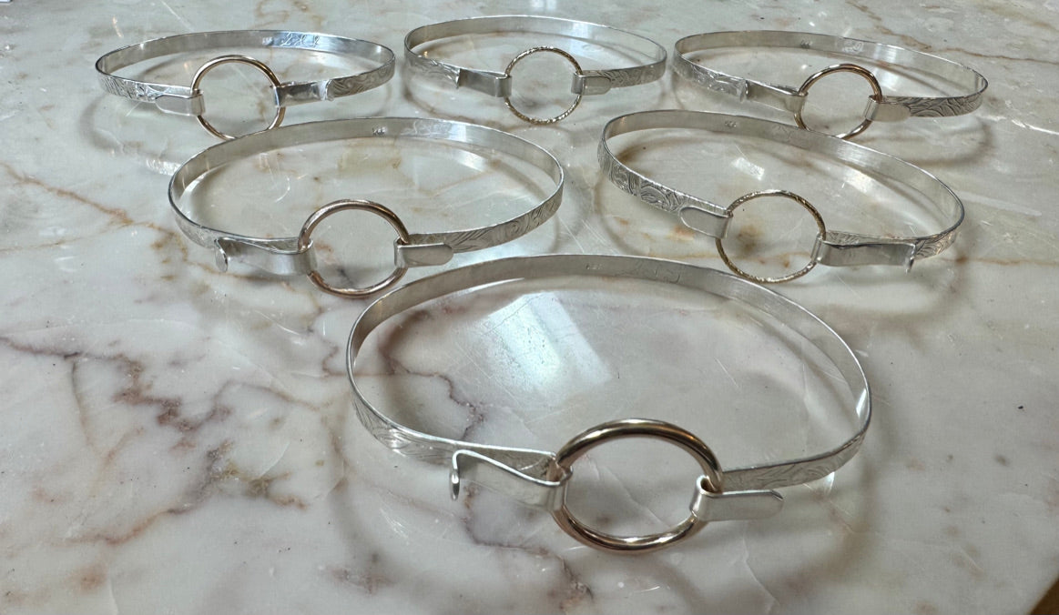 The Classic Eclipse Bracelet - Sterling Silver Hammered Band with Twisted Silver Eclipse Hoop