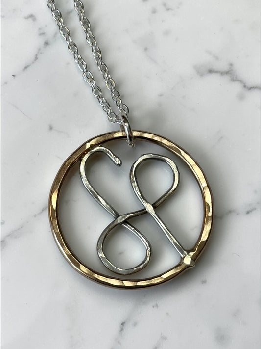 Logo necklace – Elegance By Suzanne Hrytzik