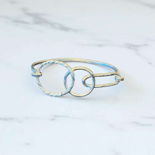 The Asymmetrical Circle Imprinted Silver Band Bracelet
